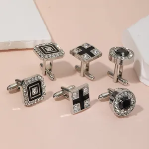 Detailed view of luxury rhinestone cufflinks in square, cross, and round geometric shapes