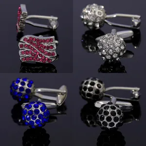 Elegant men's cufflinks set featuring round and rectangular designs with colorful crystals