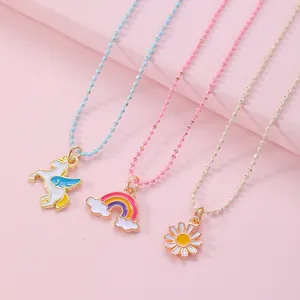 Kids BFF necklace set with unicorn rainbow and daisy charms on colorful bead chains