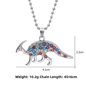 Detailed view of colorful dinosaur pendant with dimensions and bead chain length info