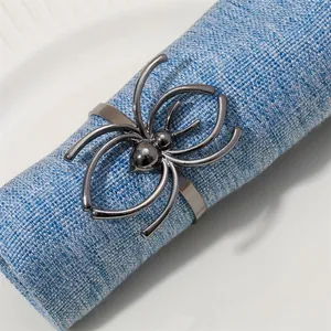 Rond de serviette araignée en métal gris foncé pour une décoration de table de banquet élégante