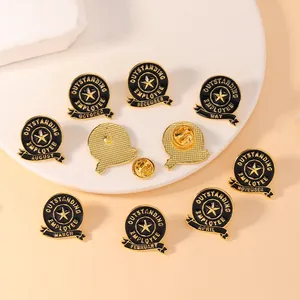 Detail of outstanding employee metal pins with gold star and butterfly clutch backing