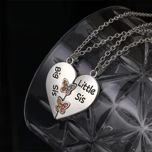 Ensemble de colliers puzzle cœur en argent poli pour sœurs avec gravures papillon colorées