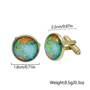 Detail view of gold world map cufflinks with dimensions and crystal glass dome