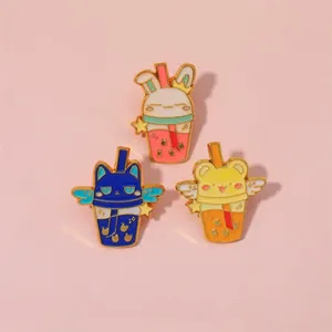 Cartoon animal milk tea enamel pins featuring rabbit and bear designs on pink background