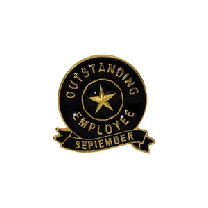 Golden Outstanding Employee enamel pin with star and September ribbon on white background