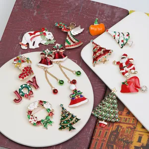Collection of festive Christmas brooches with Santa, tree, and reindeer designs