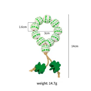 Rond de serviette en perles de bois Saint-Patrick avec trèfles verts et pompons