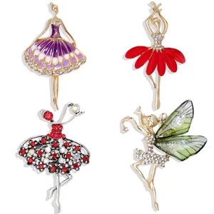 Detail view of four ballet dancers and fairy brooches with crystals and enamel finish