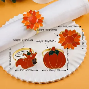 Detail view of sunflower, squirrel, and pumpkin napkin rings with dimensions and weight