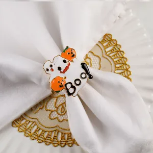 Close-up of Halloween napkin ring featuring ghost, pumpkin and Boo designs