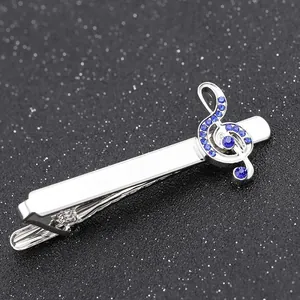 Polished silver musical note tie clip with blue crystals for men's business shirt