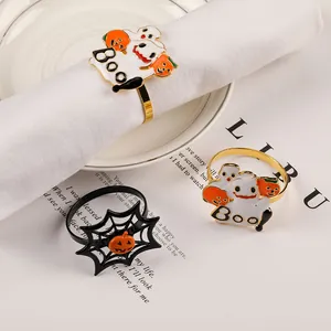 Halloween napkin rings featuring spider web pumpkin and white Boo ghost designs