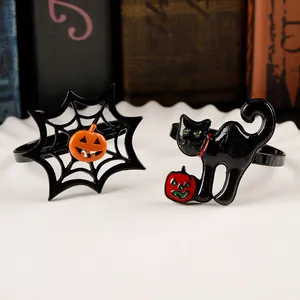 Halloween napkin rings set with spider web and black cat motifs for table decor