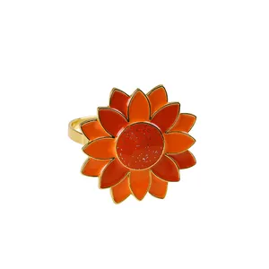 Halloween sunflower napkin ring with vibrant orange petals and gold band for table decor