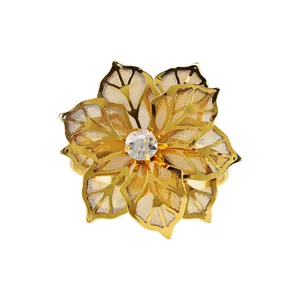 Servilletero de flor dorada de aleación con pétalos de malla y cristal central