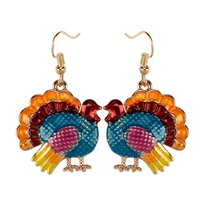 Colorful turkey drop earrings with festive enamel design and golden metal hooks