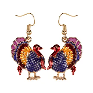 Golden Thanksgiving turkey drop earrings with colorful enamel feathers and hooks