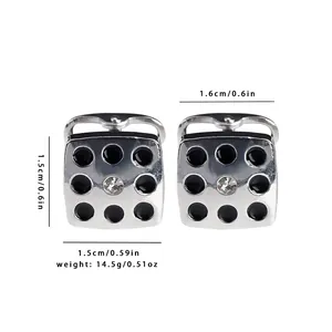 Detailed view of silver square cufflinks with black dots and center zircon crystal