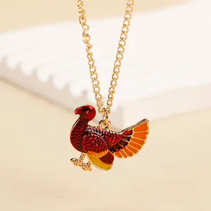 Thanksgiving turkey pendant necklace with colorful enamel on a golden cross chain