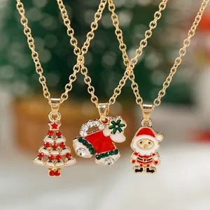 Set di collane natalizie con ciondoli Babbo Natale, renna e campanella in finitura oro