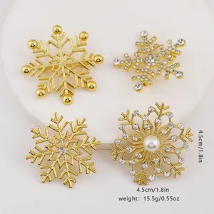 Set of four gold snowflake brooches with pearls and rhinestones, 4.5cm elegant pins
