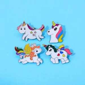 Cute set of four cartoon unicorn enamel pins with rainbow colors for bags and clothing