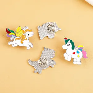 Detailed macro view of colorful enamel unicorn pins with secure butterfly clasp closures