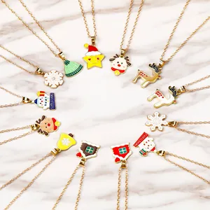 Detailed view of 12 festive gold necklaces featuring colorful Christmas charms and motifs