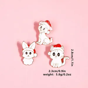 Detailed view of three Christmas animal enamel pins with sizes and weights on pink background
