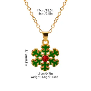 Detailed view of green snowflake pendant necklace with dimensions and chain length specs
