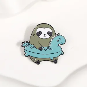 Cute cartoon sloth wearing a blue dinosaur swimming ring enamel pin badge for bags