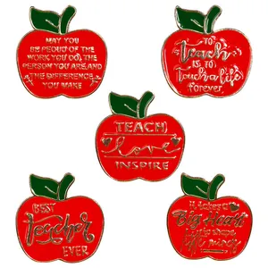 5-pack apple enamel teacher pins with red finish and inspiring gold engraved quotes