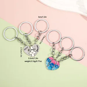 Detail view showing heart puzzle keychains with BEST Friends Forever engraving and crystals