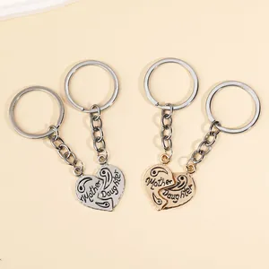 Gepolijste hartpuzzel sleutelhanger set met Moeder en Dochter gravures in goud en zilver
