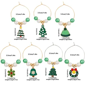 Detailed size specifications for seven Christmas wine glass charms with festive pendants