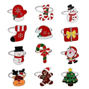 Set of 12 Christmas napkin rings featuring Santa, reindeer, and festive holiday symbols