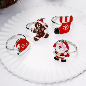 Detail of Christmas napkin ring set with Santa, gingerbread man, and sock motifs