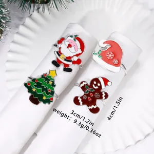 Detailed view of festive Christmas napkin rings showing dimensions and varied holiday designs