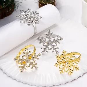 Sparkling snowflake napkin rings in gold and silver finish with crystal rhinestones
