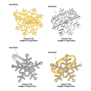 Set of gold and silver snowflake napkin rings with sparkling rhinestones for Christmas decor