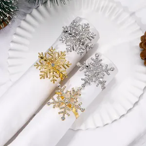 Elegant snowflake napkin rings in gold and silver with rhinestones for festive table decor