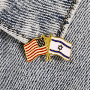Detail of USA and Israel crossed flags pin on denim jacket showing fine enamel craftsmanship