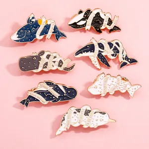 Set of 7 ocean mammal enamel pins with inspirational quotes on pink background