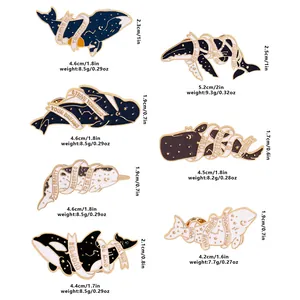 Cartoon whale enamel pins set with ocean themes and motivational slogans on white background