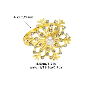 Détail du rond de serviette flocon doré avec dimensions et accents de perles de cristal