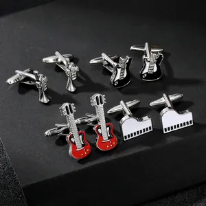 Detailed close-up of musical instrument cufflinks including guitar, piano, and saxophone