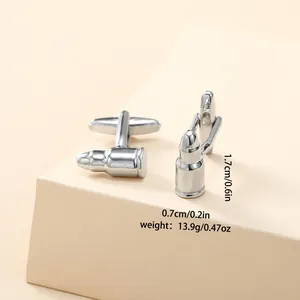 Detailed view of silver bullet-shaped cufflinks with dimension markers 1.7cm by 0.7cm