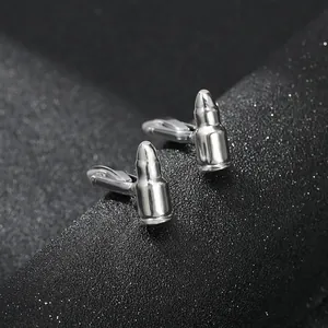 Sleek bullet shaped silver cufflinks with a polished mirror finish for men's French shirts
