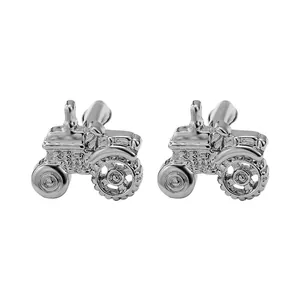 Polished silver tractor shaped cufflinks for men with detailed wheels and seat design